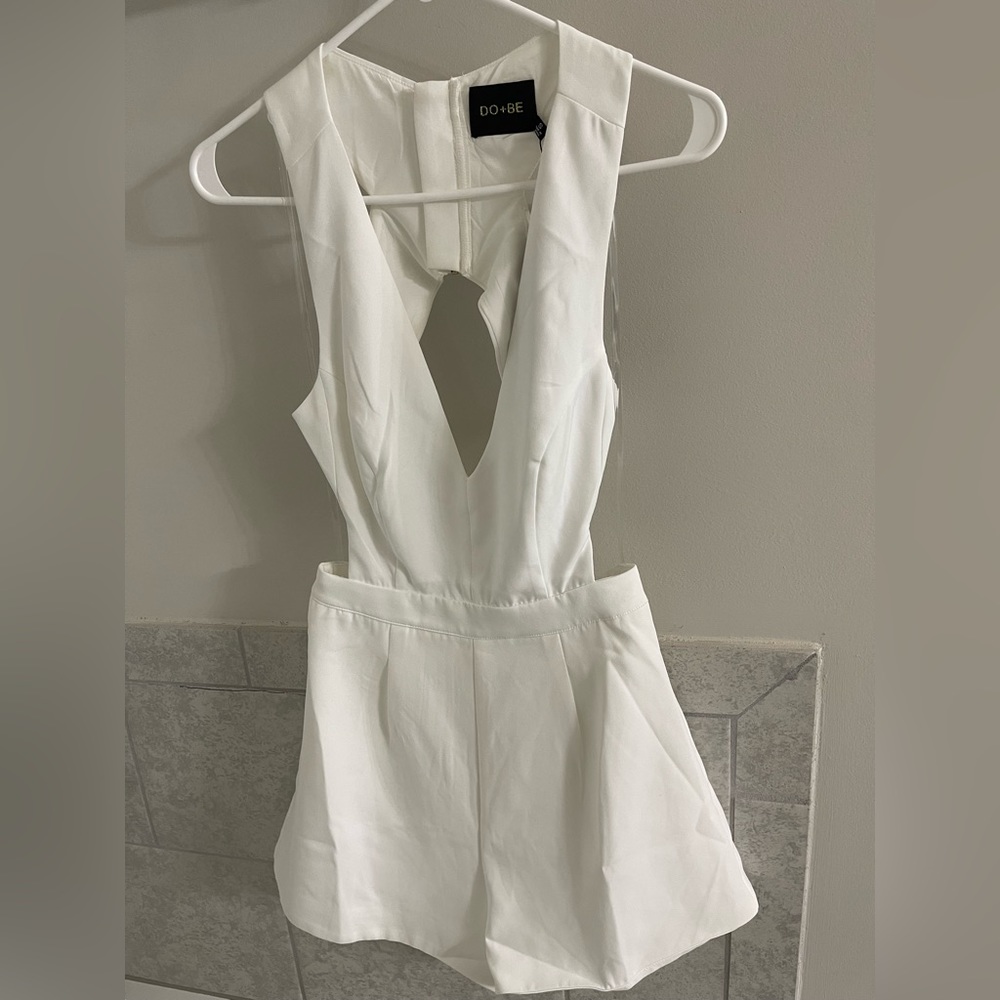 White romper size small. NWT.